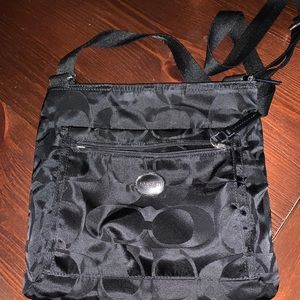 Black Coach nylon getaway bag